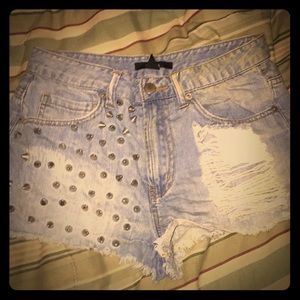 Studded and distressed shorts